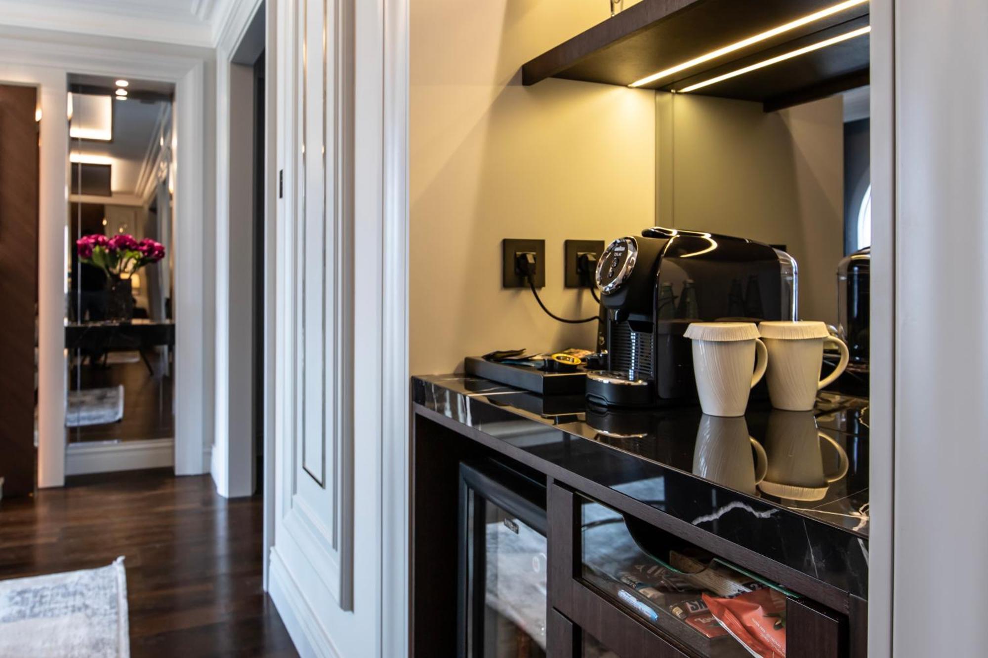 Xheko Imperial Luxury Hotel & Spa Tirana Exterior photo A Nespresso machine in a hotel room