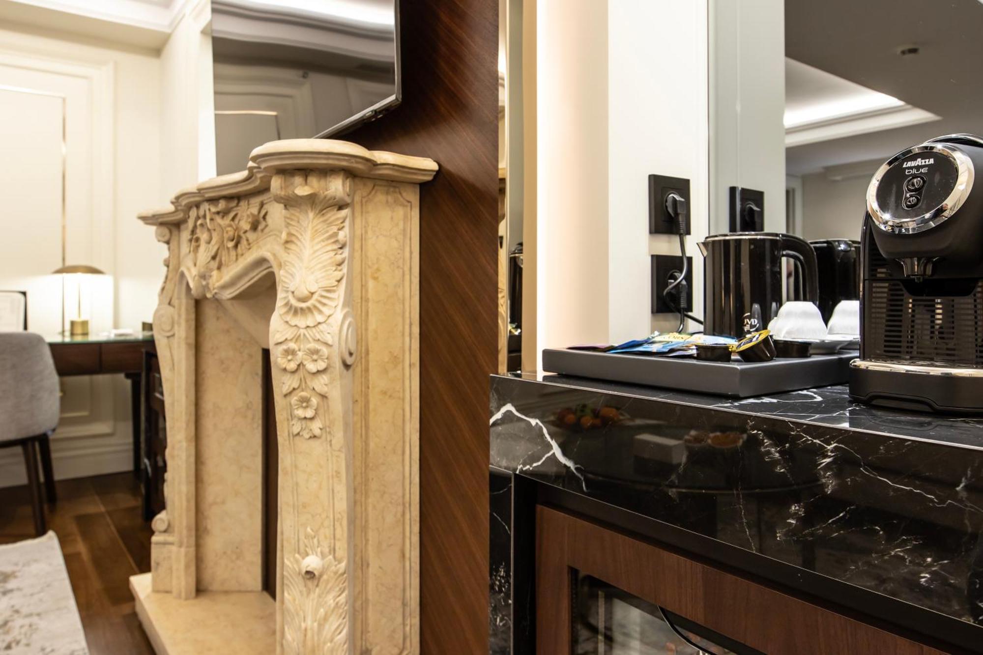 Xheko Imperial Luxury Hotel & Spa Tirana Exterior photo A Nespresso machine in a hotel room