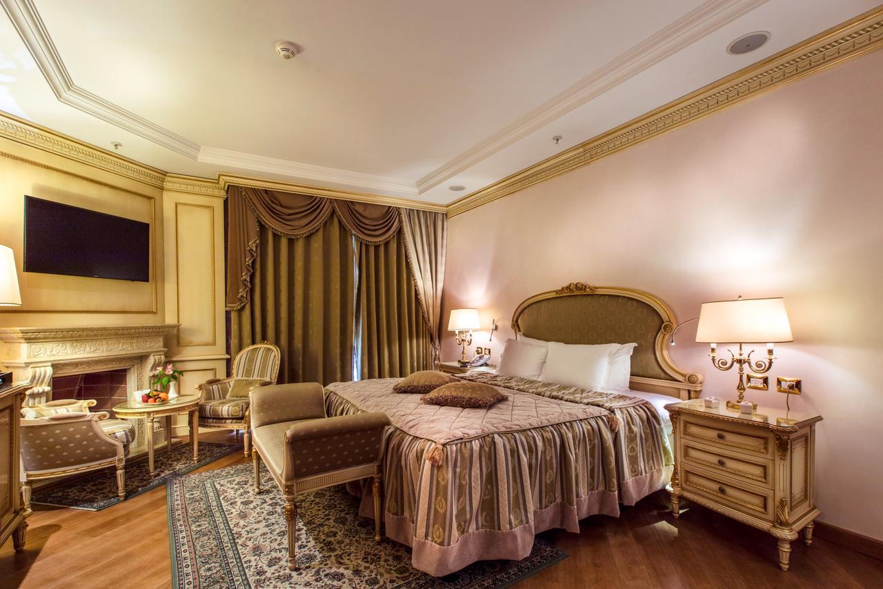 Xheko Imperial Luxury Hotel & Spa Tirana Exterior photo A bedroom at the hotel