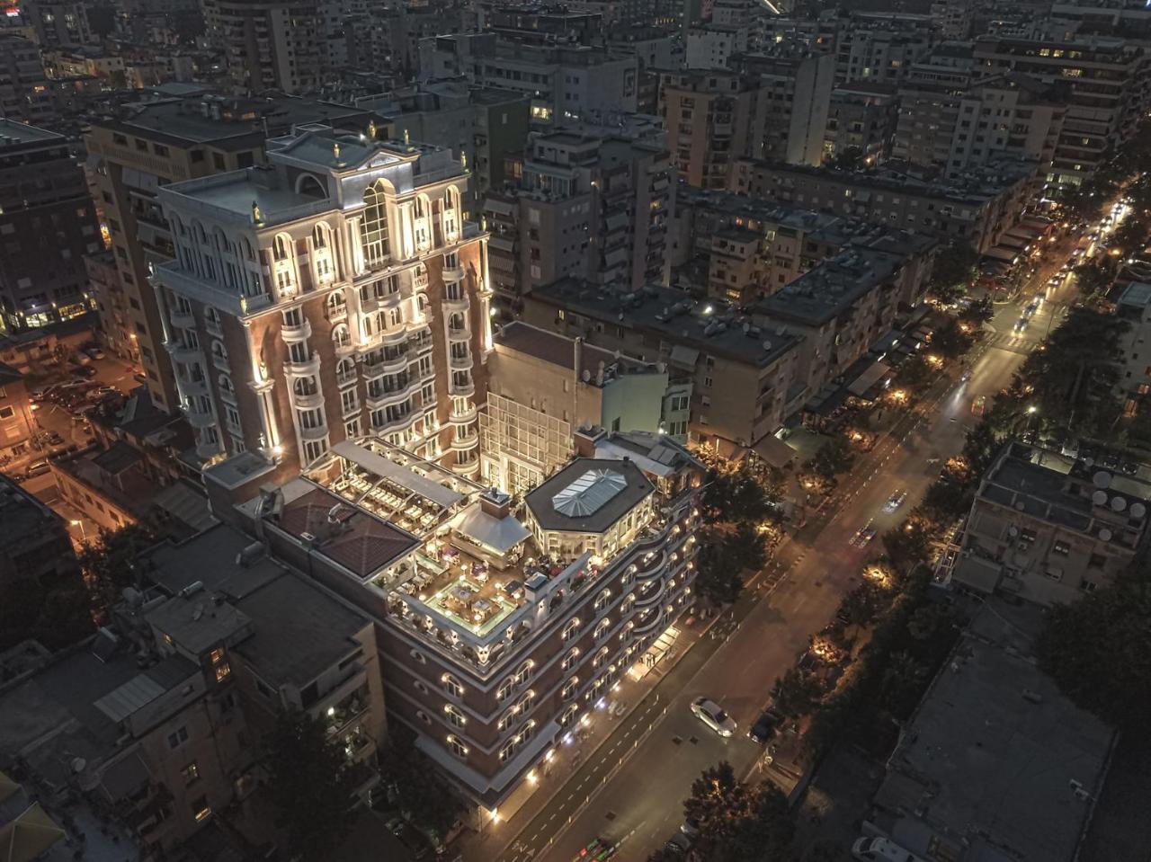 Xheko Imperial Luxury Hotel & Spa Tirana Exterior photo The hotel at night