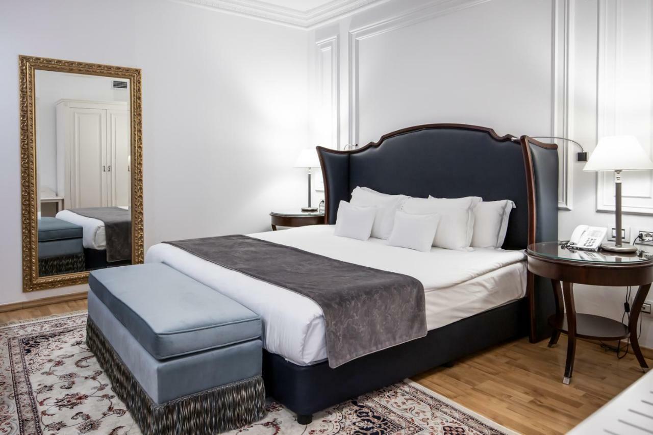 Xheko Imperial Luxury Hotel & Spa Tirana Exterior photo A bedroom at the hotel